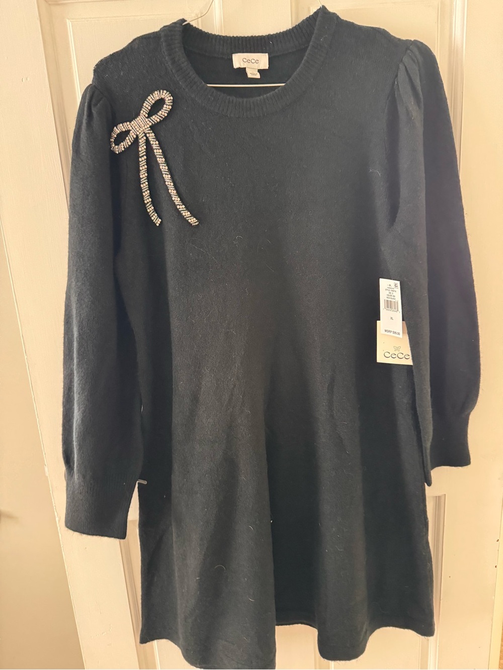 CeCe Black Long-Sleeve Crewneck Sweater Dress with Rhinestone Bow Accent